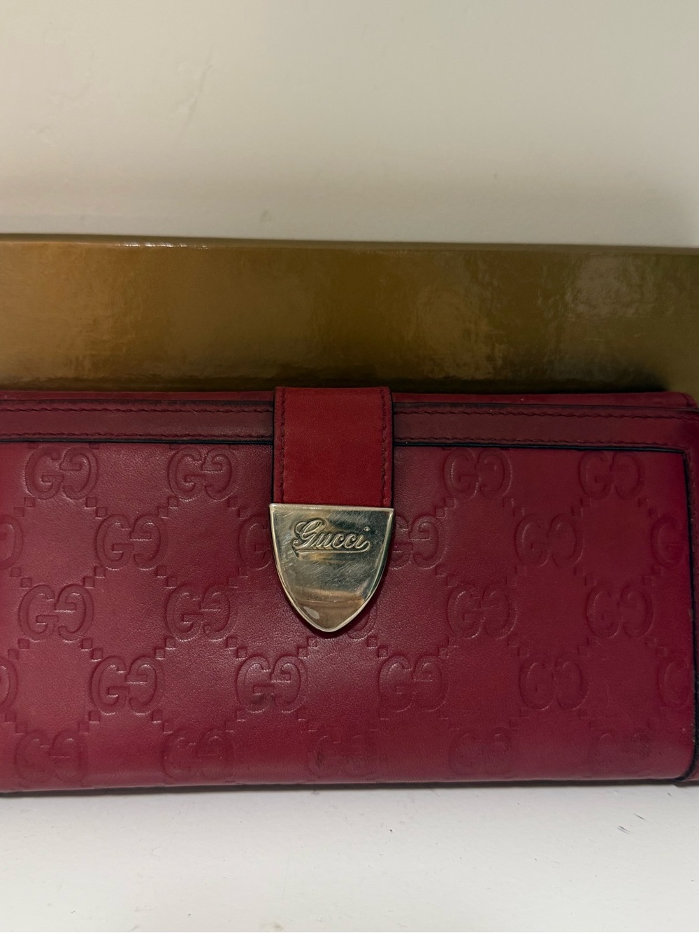 Gucci Red Embossed GG Leather Wallet with Gold-Tone Logo Clasp